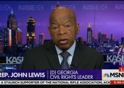 Rep. John Lewis in front of background image of Atlanta skyline at night for MSNBC Live